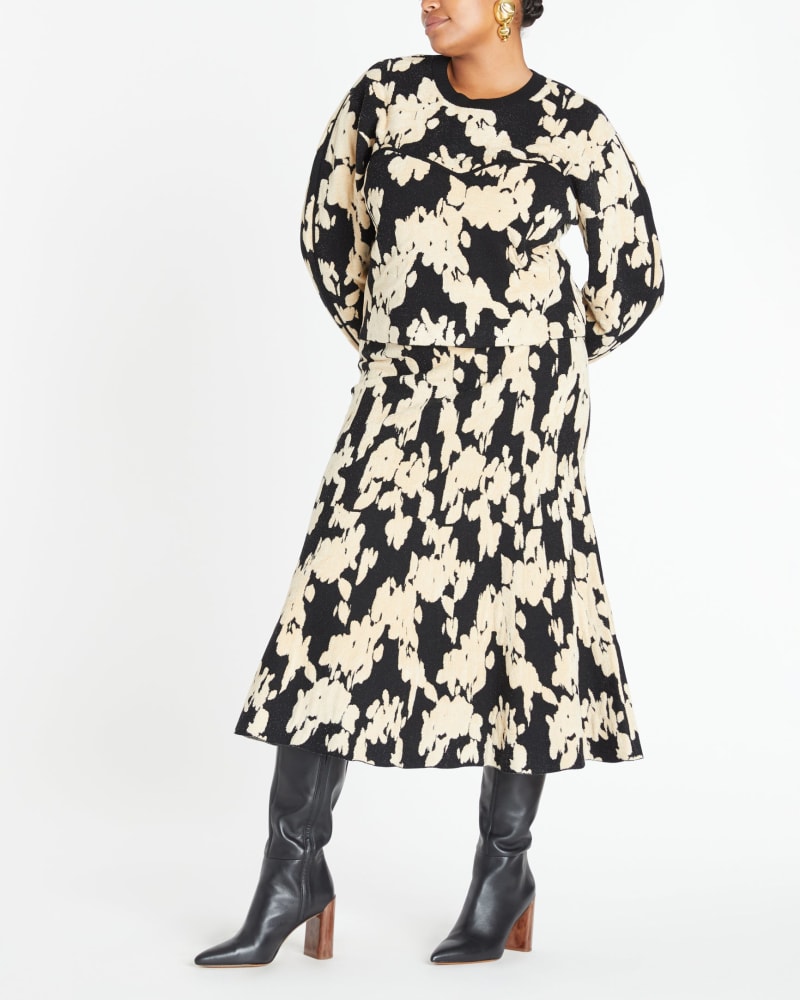 Front of a model wearing a size 1X Ripley Knit Skirt in Pebble/Black by Tanya Taylor. | dia_product_style_image_id:312301